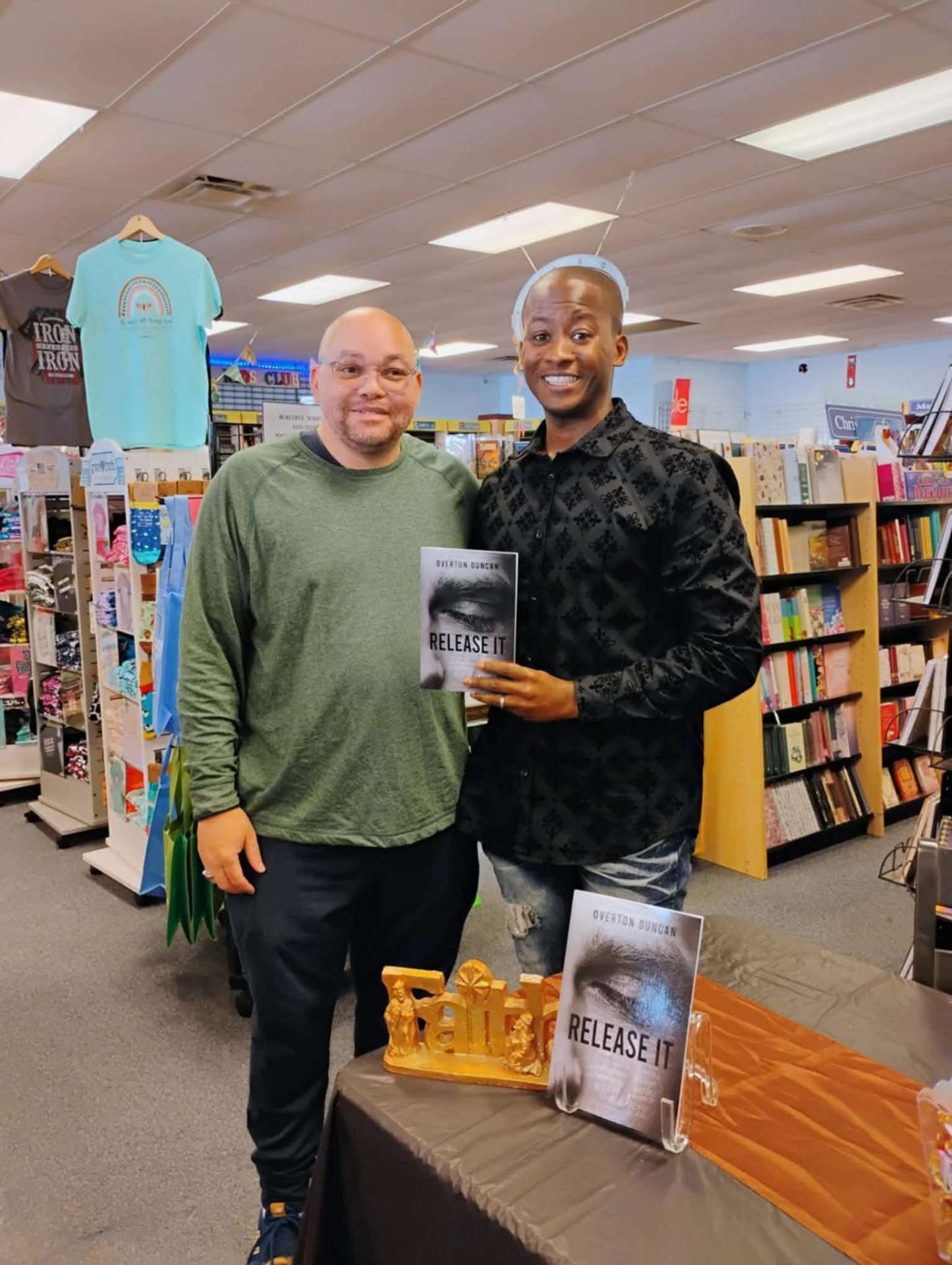 Overton Duncan with a reader holding Release It