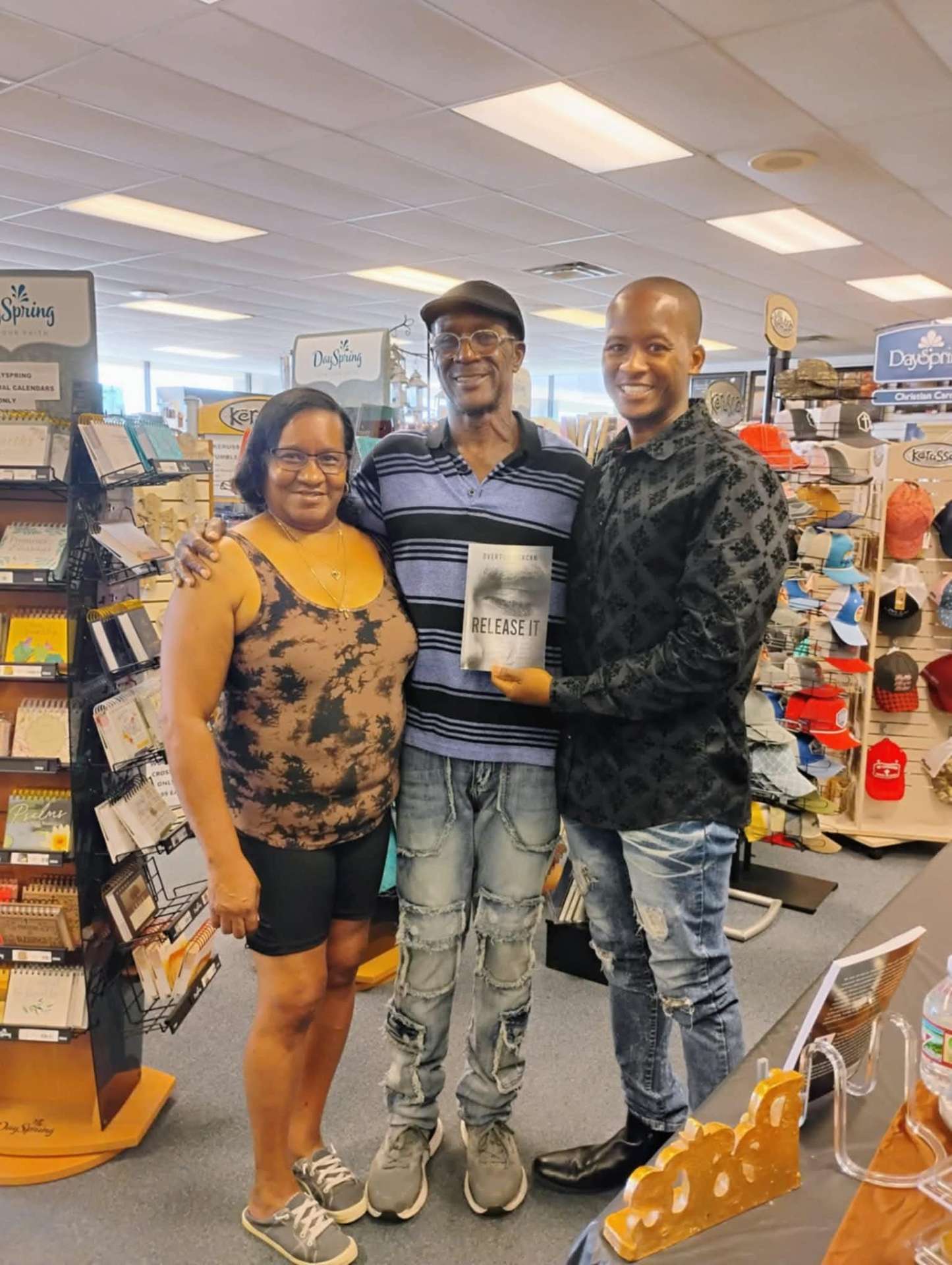 Overton Duncan with a reader at a bookstore